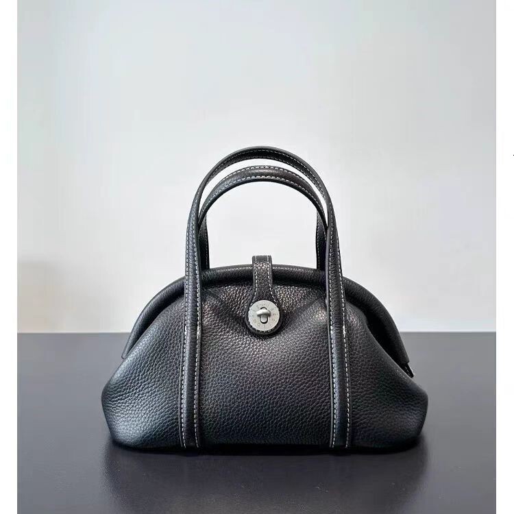 Designer 2025 New Model Vegetable Tanned Leather Clip Catfish High-end Feel Top Layer Cowhide Shell Shoulder Handbag Dumpling Light Luxury Women'