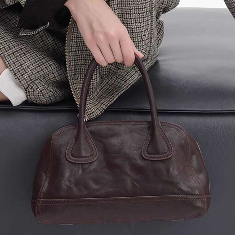 Korean New Niche Bowling Handheld Women's Soft Leather High-Quality Simple Versatile Shoulder Crossbody Bag