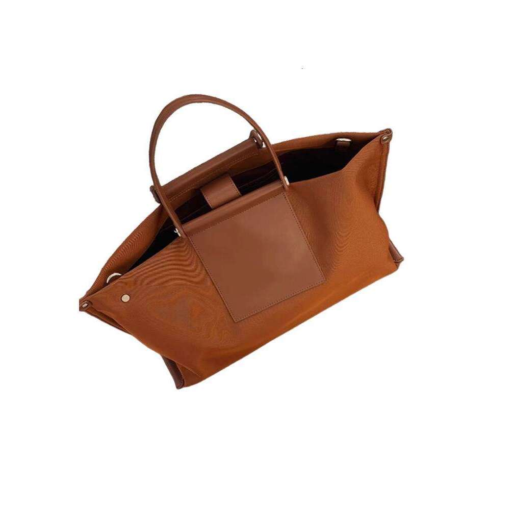 Spacious Interior Design Featuring multiple compartments including zippered pockets, making it easy to organize your belongings efficiently