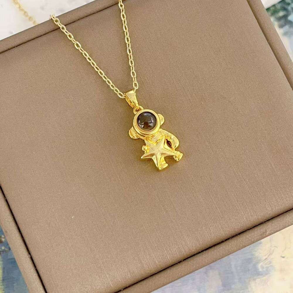 New Couple For Men And Women, 100 Languages Projection Stone Pendant, Fashionable Astronaut Necklace 12A