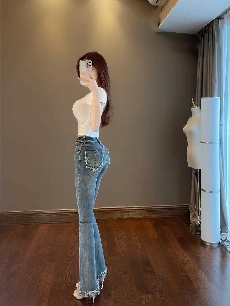 2023 New WOMENGAGA Tassel Flare Pants Jeans Slim High Waist Elastic Horseshoe Pants Denim Trousers Fashion Women Sexy K5BG R250716
