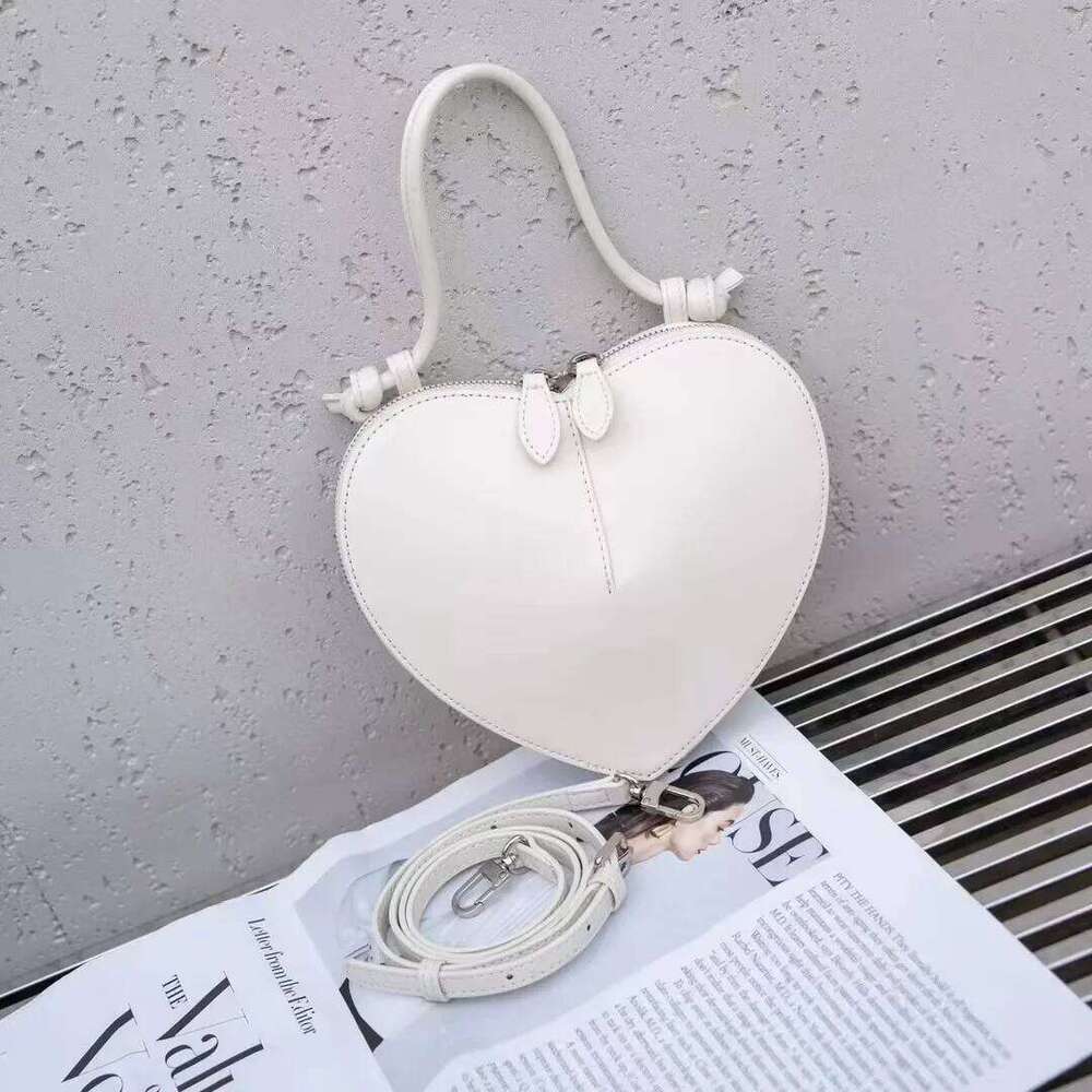 New 2024 Spring Summer Women's Heart Shaped Leather Motorcycle Peach Blossom Single Shoulder Crossbody Bag From China