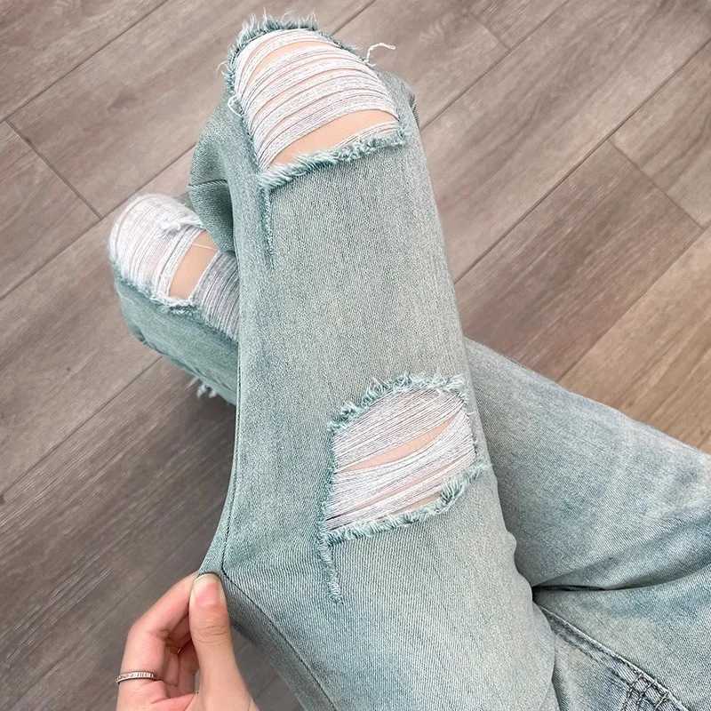 2025 New Womens Ripped Frayed Jeans Spring and Autumn High Waist Slim Slimming Horseshoe Flared Pants R250716