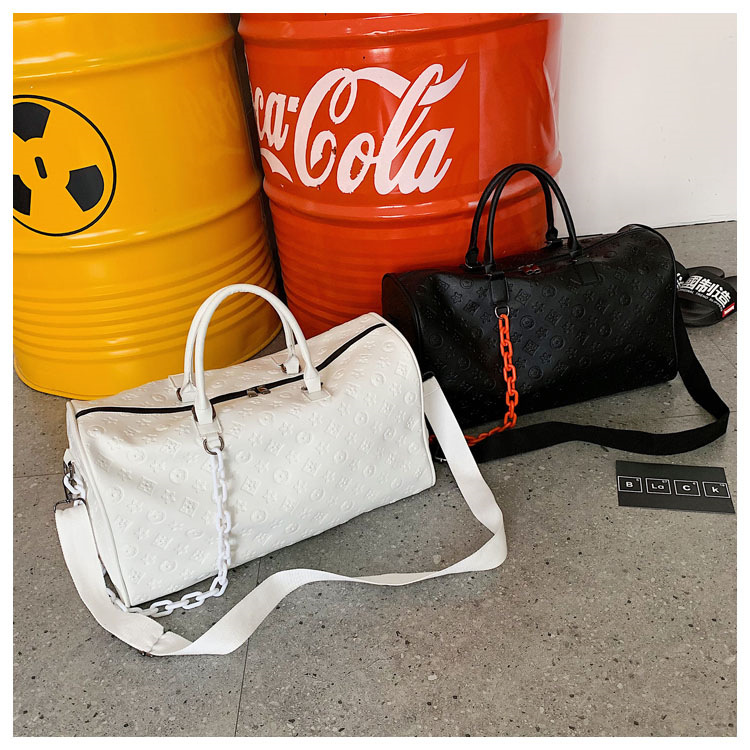 2025 Small - distance travel bag, large - capacity PU hand - carried business travel luggage bag fashionable embossed sports and fitness bag