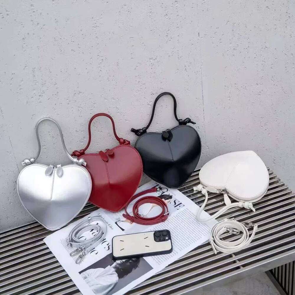 New 2024 Spring Summer Women's Heart Shaped Leather Motorcycle Peach Blossom Single Shoulder Crossbody Bag From China