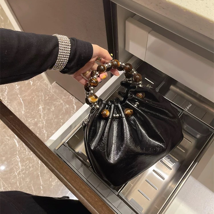 Luxury Women's New Chain Shoulder Crossbody Bag Free Shipping Designer Fashion Bead Carrying Cloud Bag Versatile Casual Shopping Bag