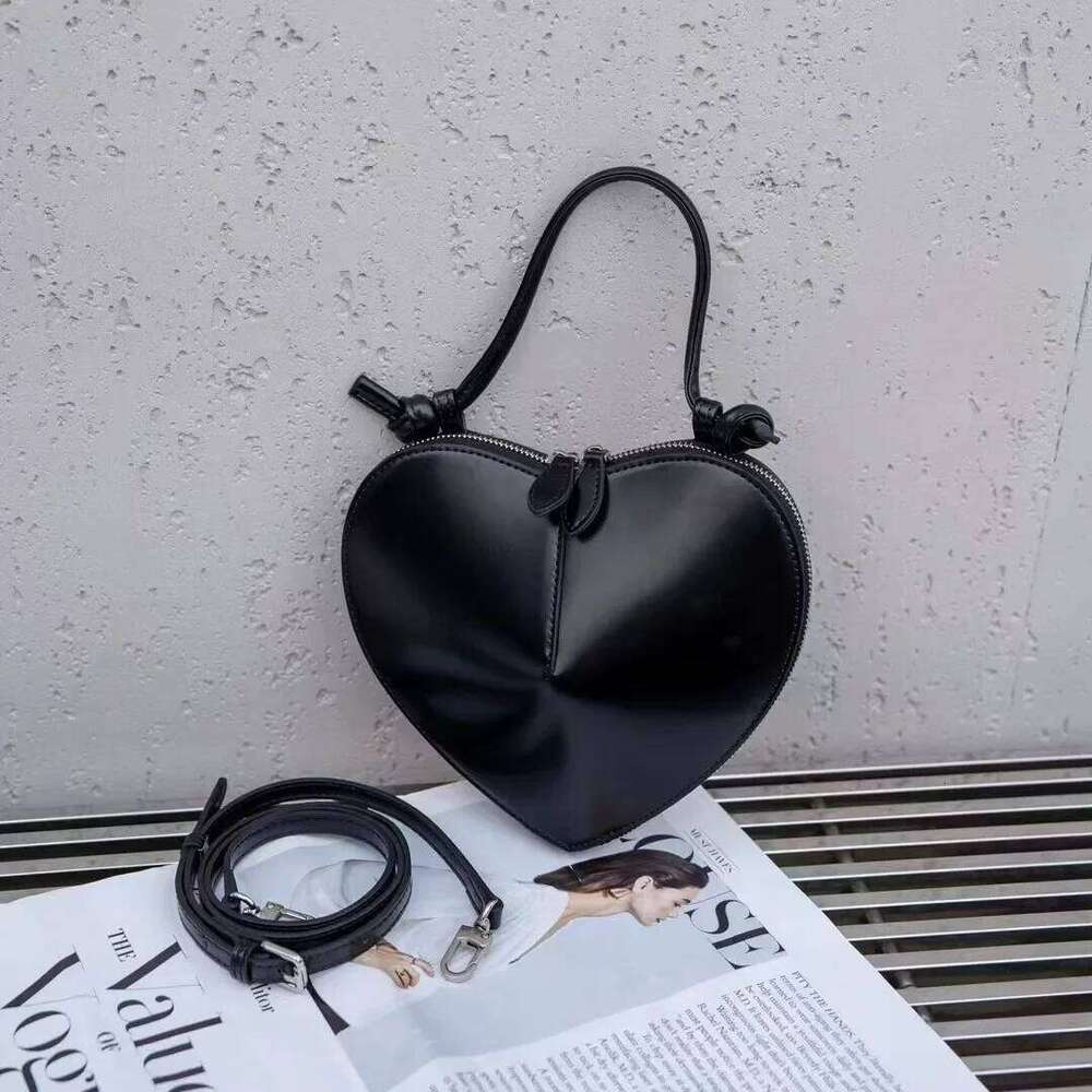 New 2024 Spring Summer Women's Heart Shaped Leather Motorcycle Peach Blossom Single Shoulder Crossbody Bag From China