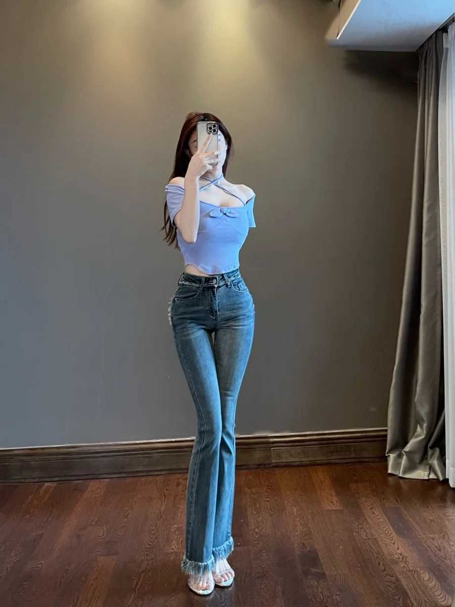 2023 New WOMENGAGA Tassel Flare Pants Jeans Slim High Waist Elastic Horseshoe Pants Denim Trousers Fashion Women Sexy K5BG R250716