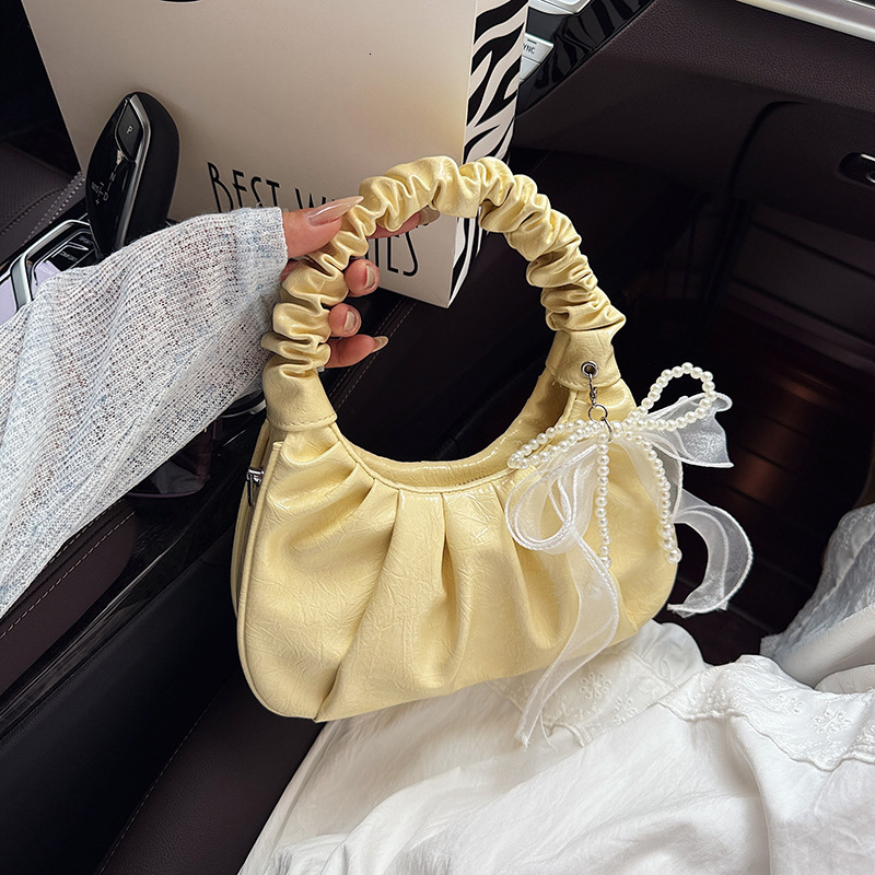 Summer new women's women's shoulder crossbody bag, women's bag, summer new candy colored pleated cloud bag, simple and elegant armpit b