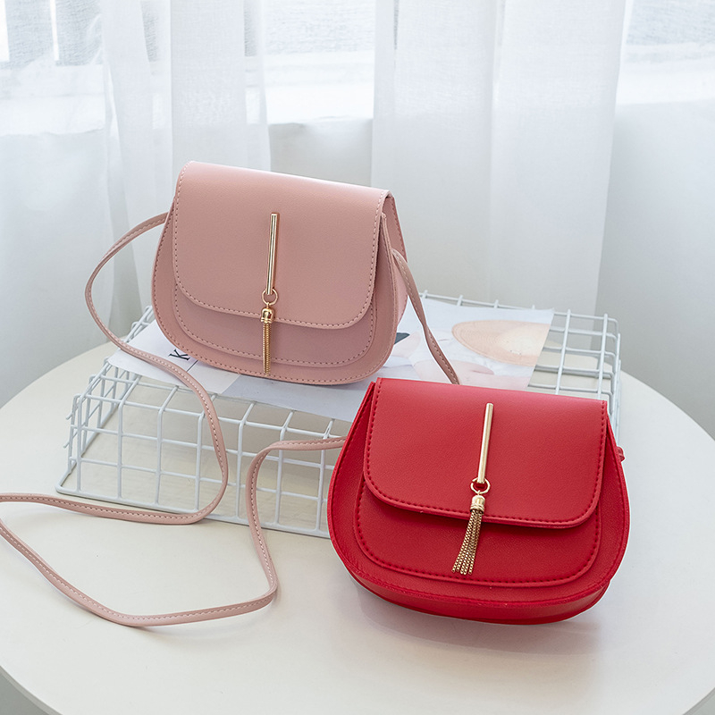 hot free shipping designer womens mini crossbody bag casual tassel fashionable plain saddle bag