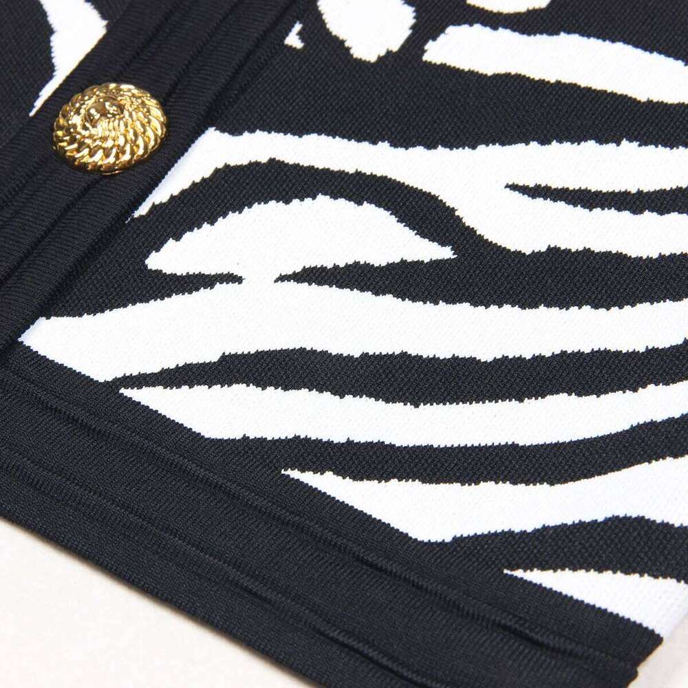 Spring And Autumn New Fashionable Style Knitted Elastic Zebra Pattern Long Sleeve Top Slimming Short Skirt Commuter Women's Set