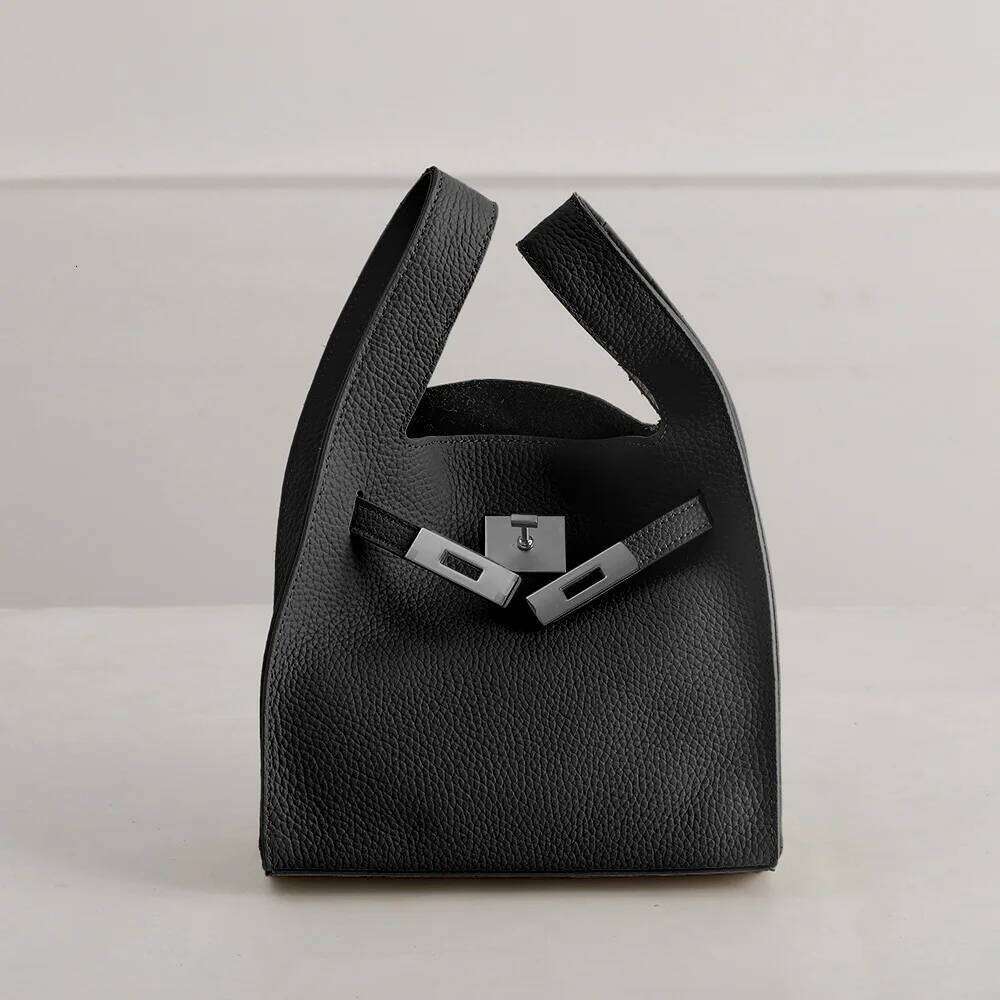 Genuine leather basket handbag 2025 new niche design top layer cowhide garbage women's one-shoulder crossbody bag