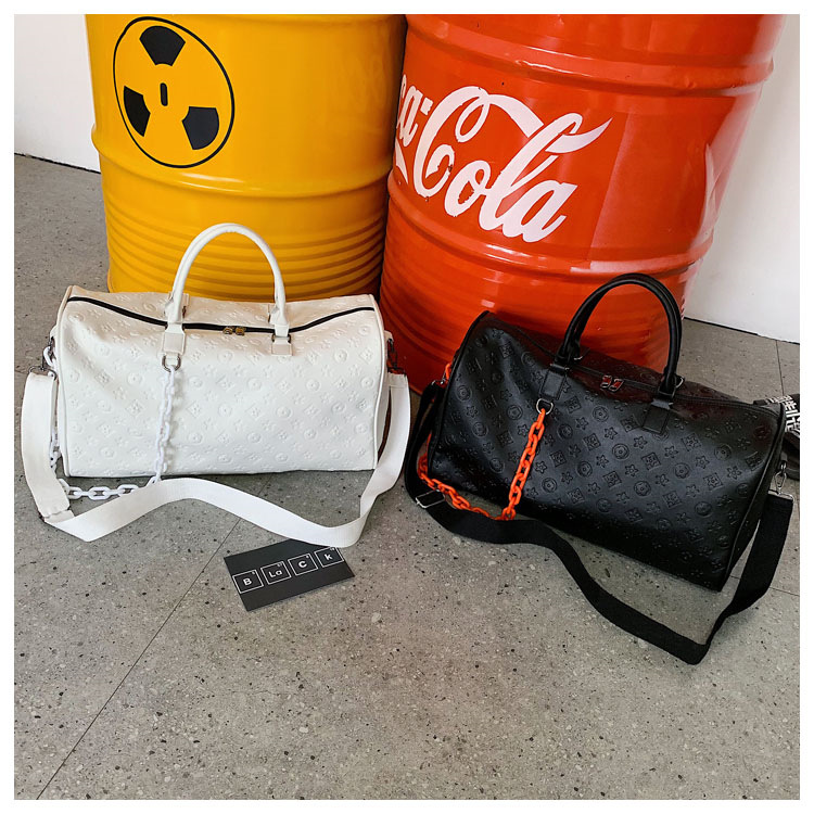 2025 Small - distance travel bag, large - capacity PU hand - carried business travel luggage bag fashionable embossed sports and fitness bag