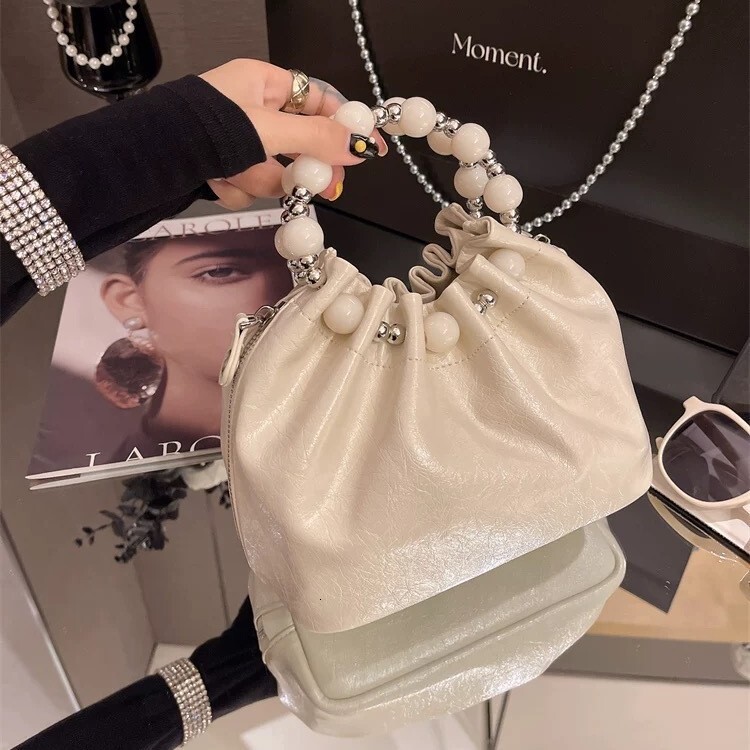 Luxury Women's New Chain Shoulder Crossbody Bag Free Shipping Designer Fashion Bead Carrying Cloud Bag Versatile Casual Shopping Bag