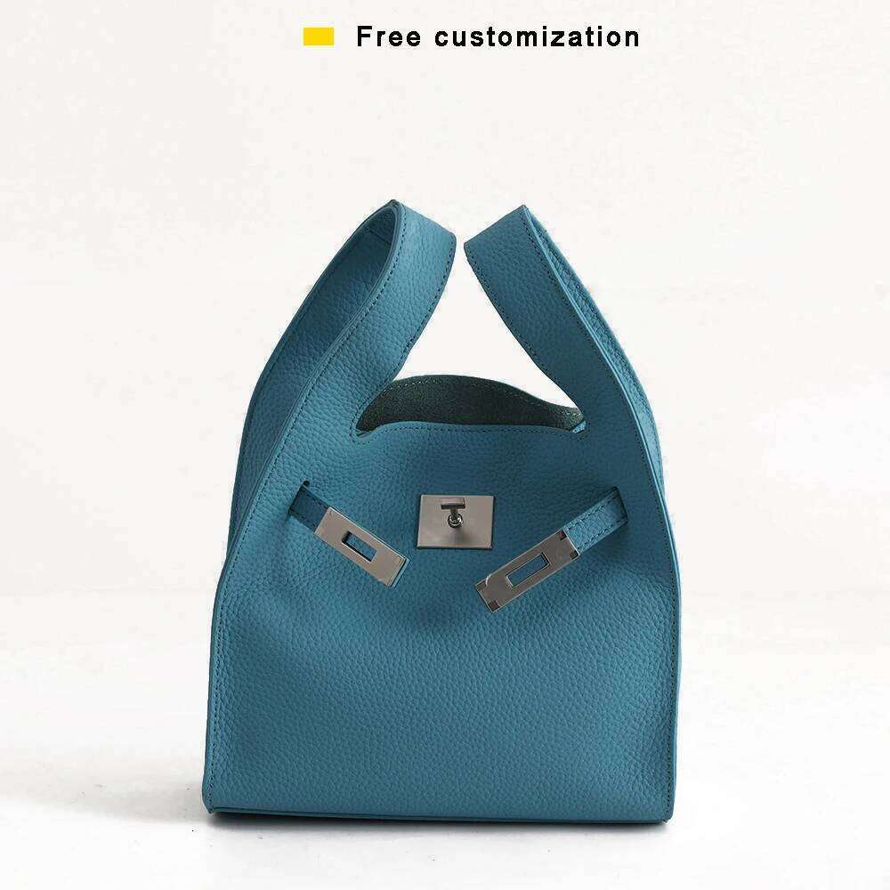 Genuine leather basket handbag 2025 new niche design top layer cowhide garbage women's one-shoulder crossbody bag