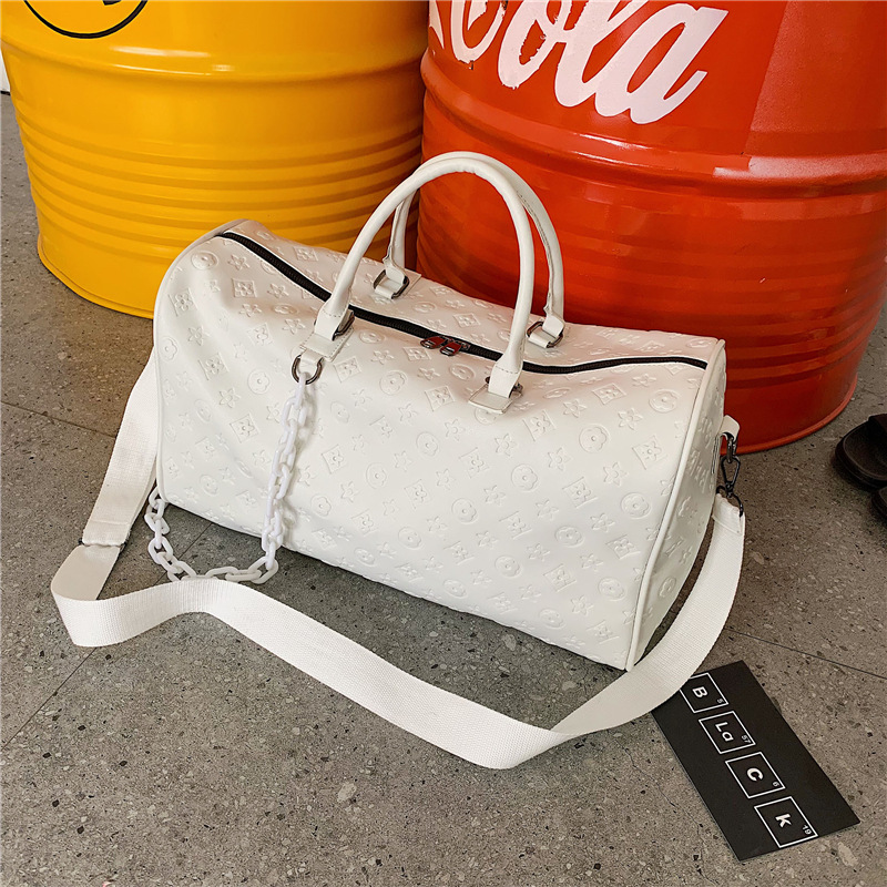 2025 Small - distance travel bag, large - capacity PU hand - carried business travel luggage bag fashionable embossed sports and fitness bag