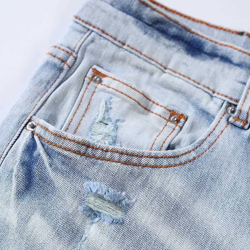 Fashionable with stretch slim fit perforated blue patch washed light blue jeans high street hip-hop brand designer X250718