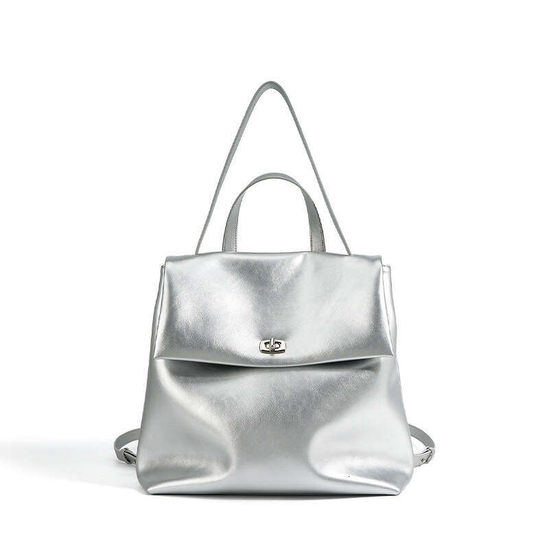 Luxury designer autumn new INS ladies silver Korean version of leather niche fashion trend campus wind backpack