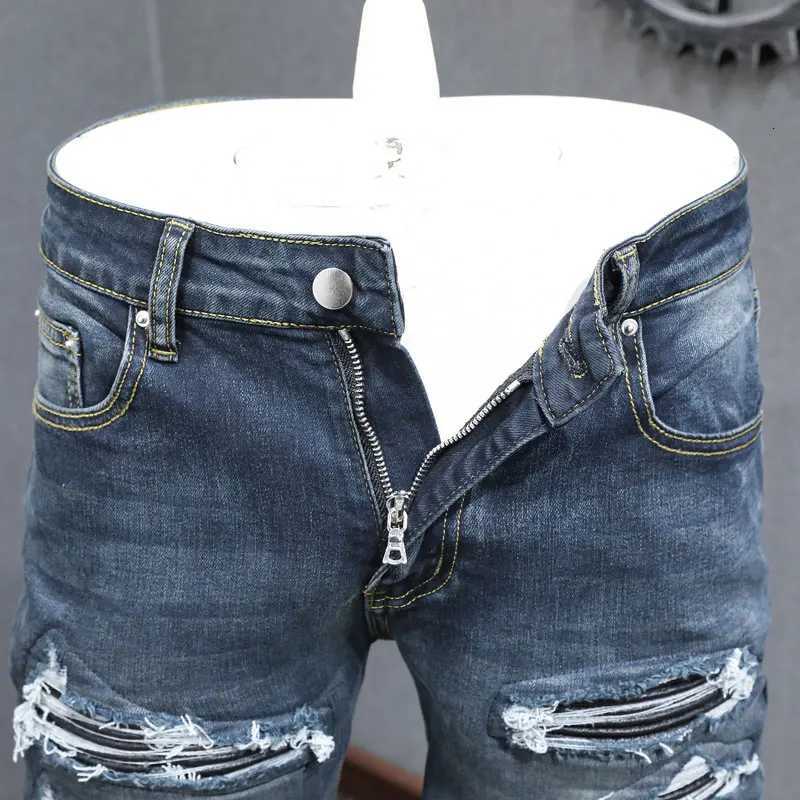 Designer High Street Fashion Jeans Stretch Slimming Washed Deep Blue Jeans Black Leather Patch Hip Hop Brand Pants Hombre X250718