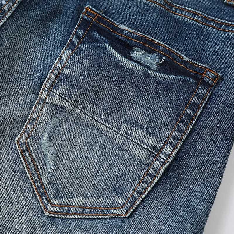 Street fashion boutique mens retro blue ripped patch jeans elastic tight jeans designer hip-hop brand high-quality pants for men X2507181