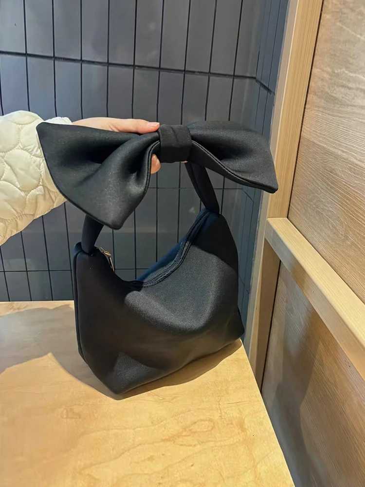 2025 new cute mini bow handbag fashionable and casual daily commuting womens bag cloud bag suitable for daily use Z250718