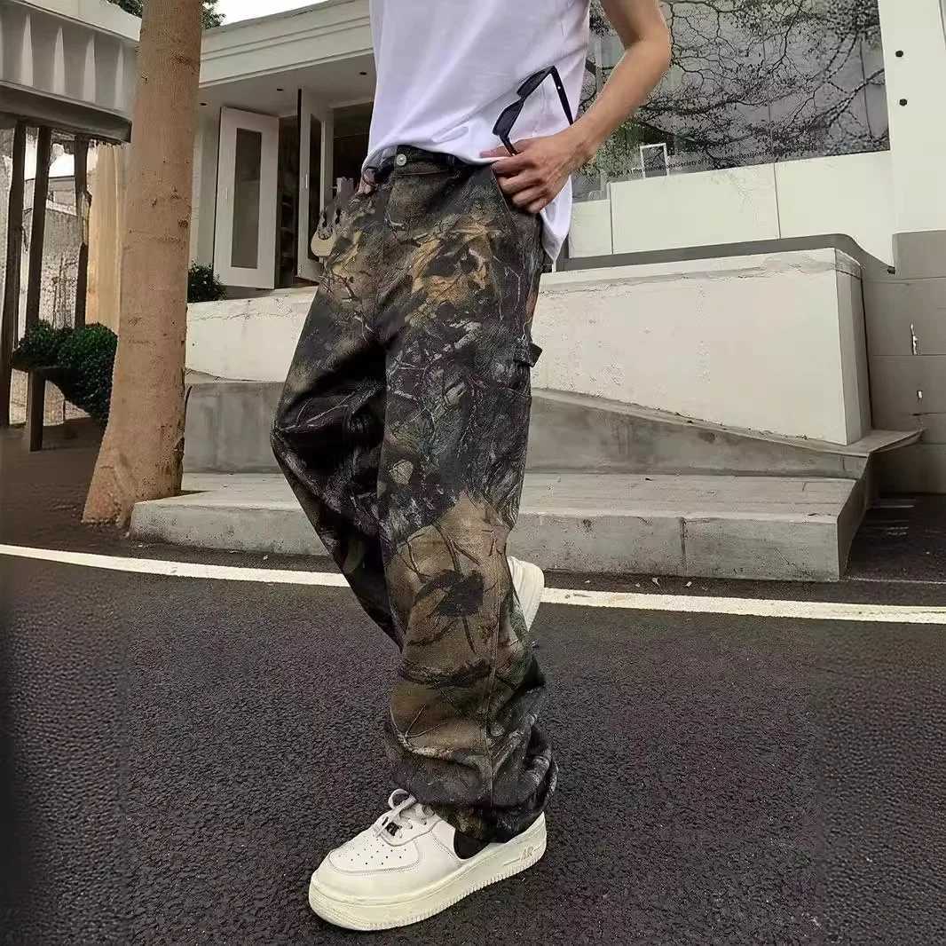 2024 Fashionable Mens Work Jeans with European and American High Street Washed Spliced Camouflage Leaf Print. X250718