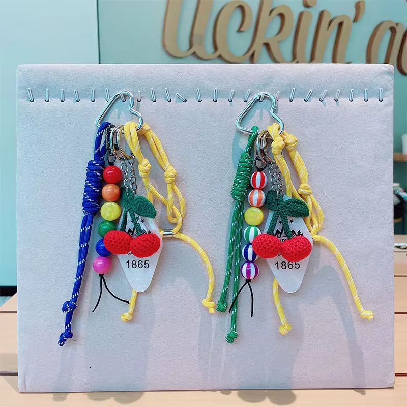 Braided Rope Bag Pendant Keychain Knitting Pendant Ruths Same Style Cherry Pendant Suitable for Phone Bag Accessories 250717