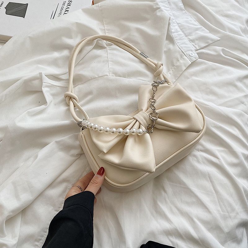 Summer New Women's Single Shoulder Crossbody Bag Summer New Solid Color Bow Chain Design Fashion Women's Texture Underarm Bag New Designer B