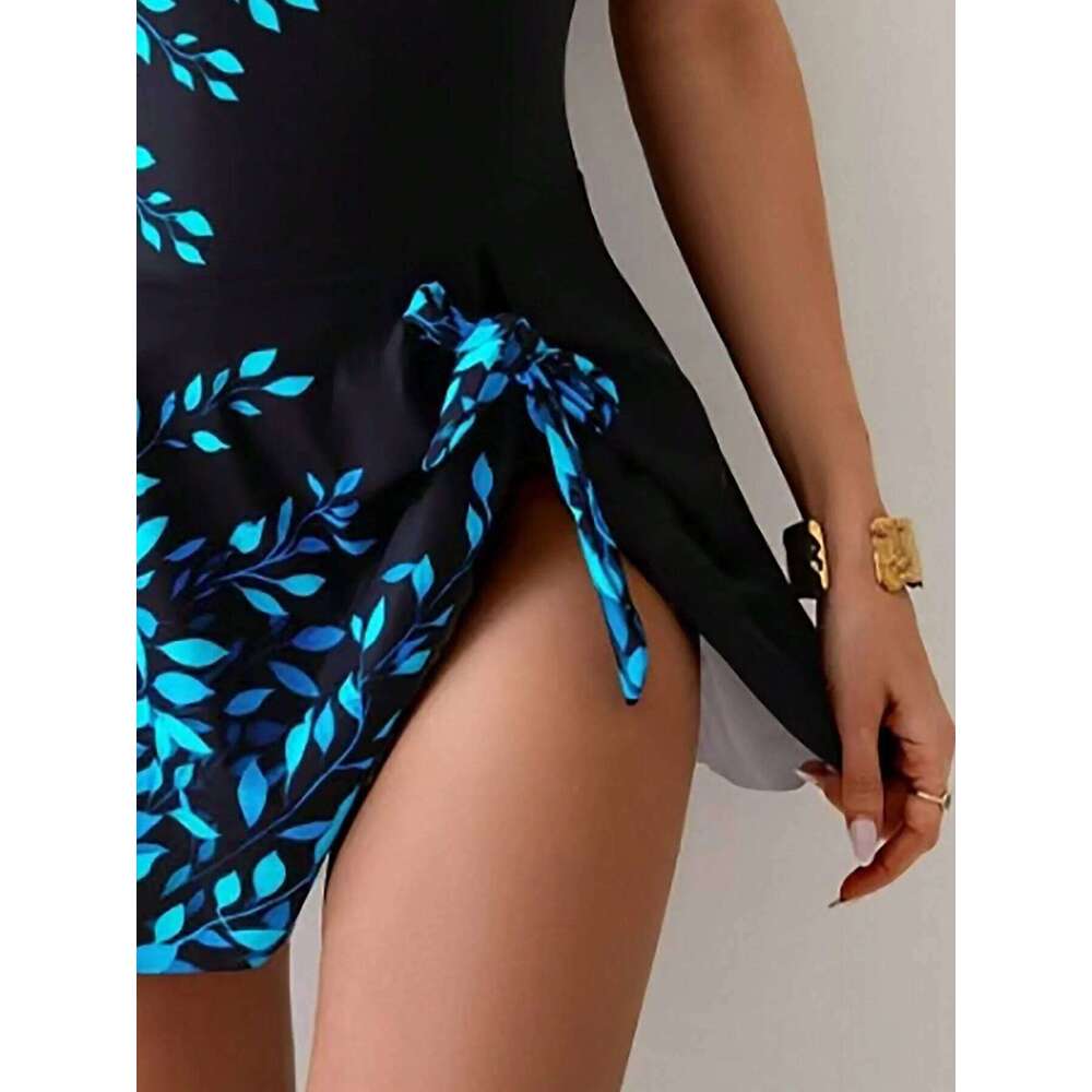 Fashionable Modest One-Piece Swimsuit for Women with a Leaf Print And Skirt, Designed to Flatter The Figure.
