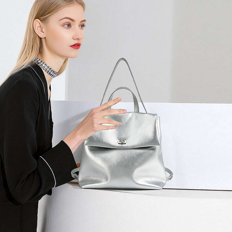 Luxury designer autumn new INS ladies silver Korean version of leather niche fashion trend campus wind backpack