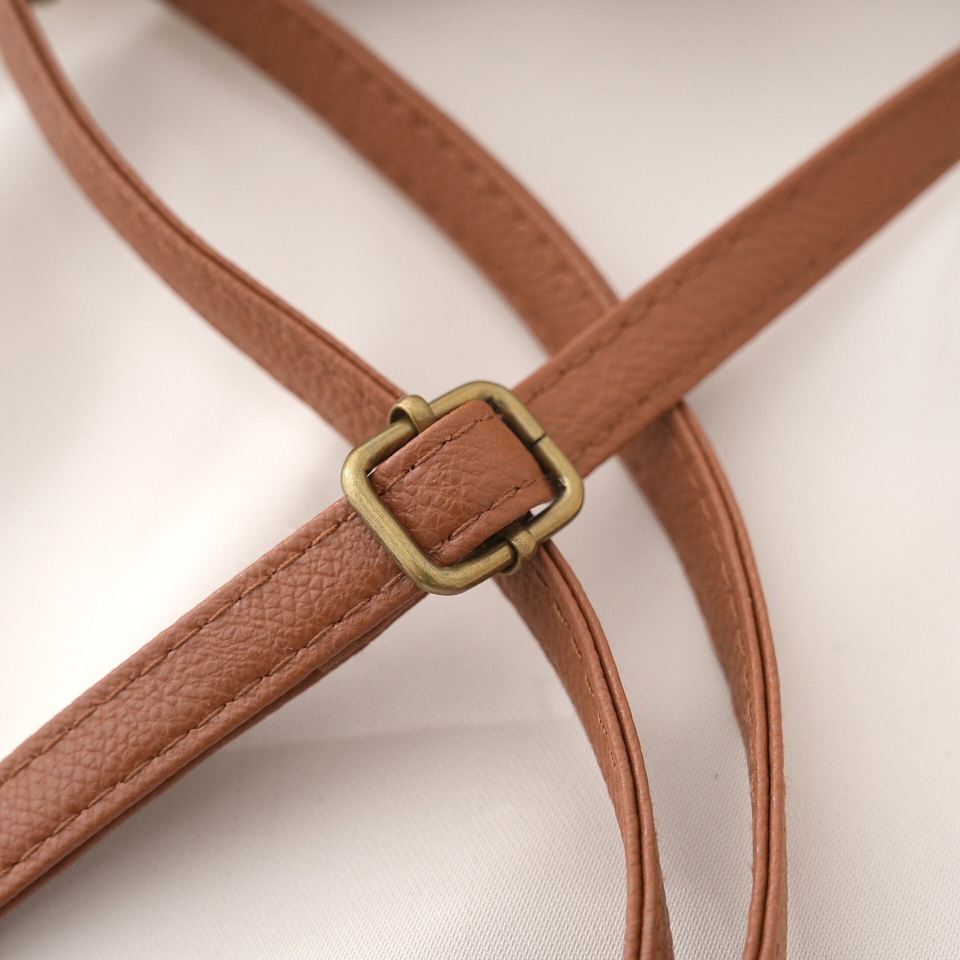 2025 designer's new tassel small bag hand woven multifunctional single shoulder straw bag hollow antique crossbody bag