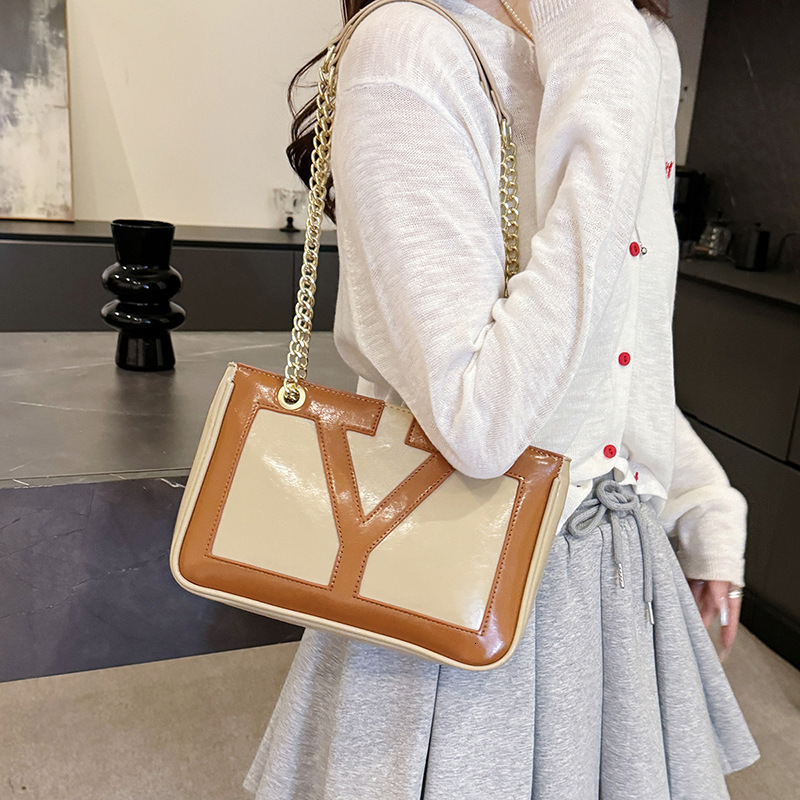 Free shipping designer bag 2025 New fashion patchwork Underarm Bag Women Temperament Commuter Bag casual Shoulder Bag PU Texture Chain Crossbody Bag