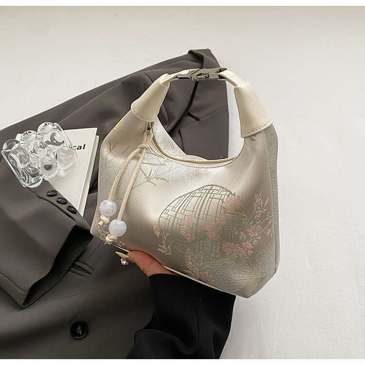 handheld new chinese style 2024 summer fashion embroidered pea niche highend simple crossbody bag for women