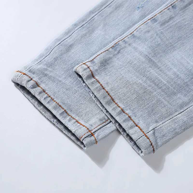 Fashionable with stretch slim fit perforated blue patch washed light blue jeans high street hip-hop brand designer X250718