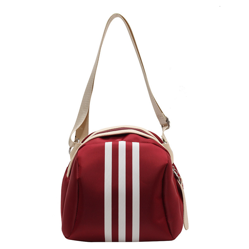 2025 summer women's new women's shoulder crossbody bag new striped shell bag summer new casual large capacity new designer bag
