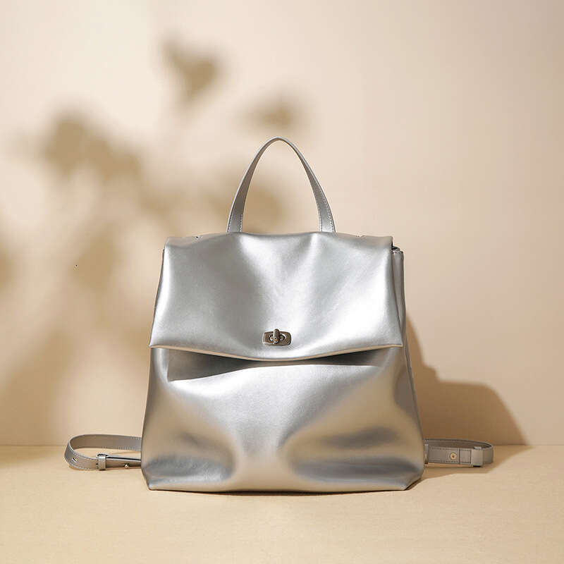 Luxury designer autumn new INS ladies silver Korean version of leather niche fashion trend campus wind backpack
