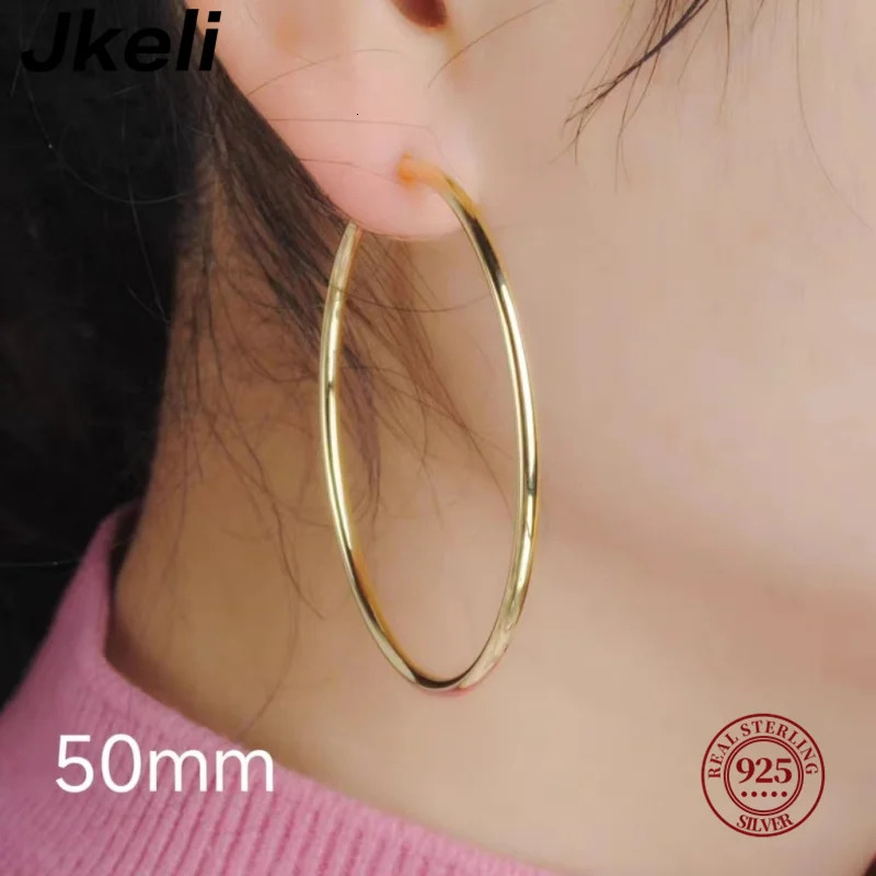 Jkeli Genuine 925 Sterling Silver Fashion Korean Simple Hoop Earrings for Women Men Charming Chic Party Jewelry Accessories 250716