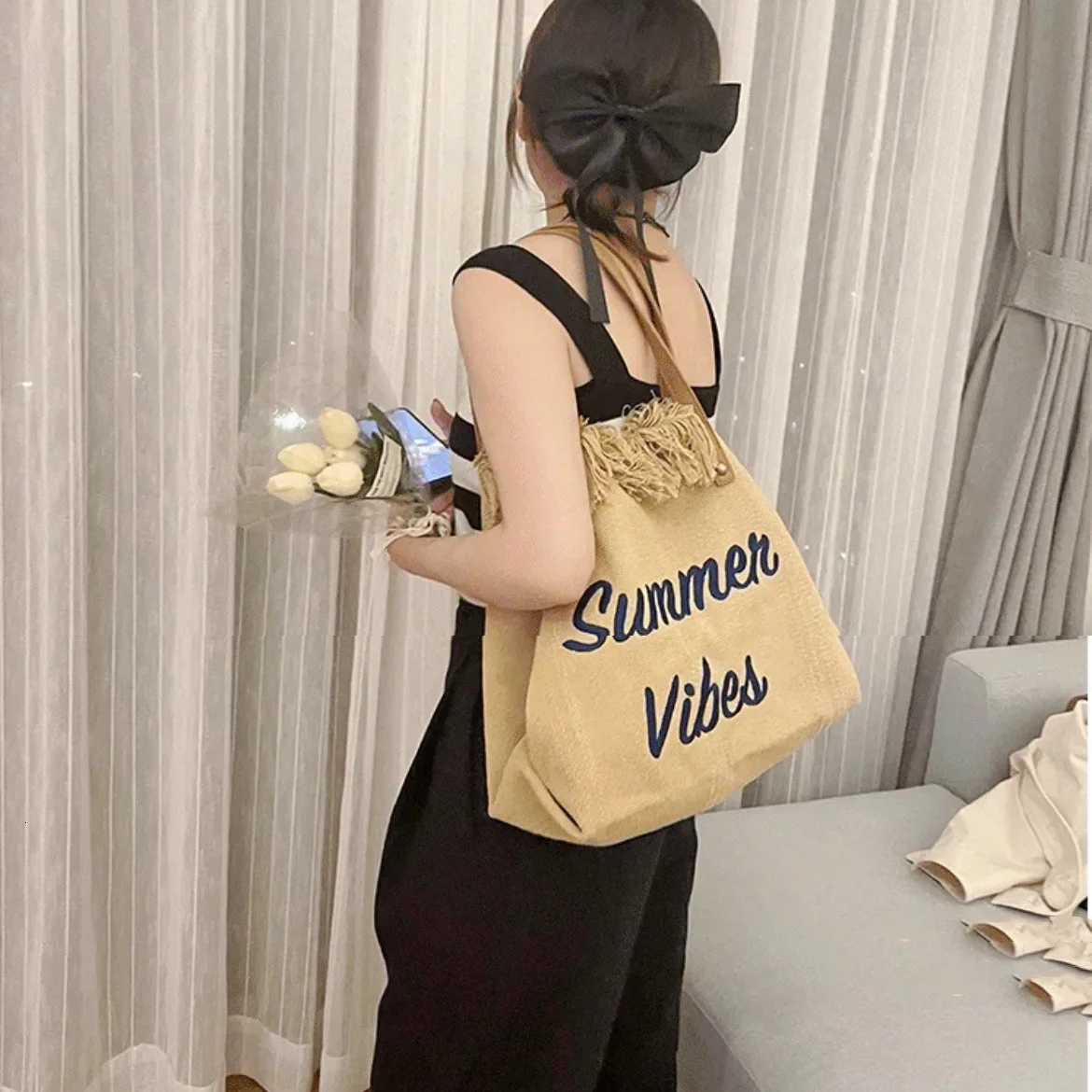 Handbag Woman Bag Design Simple Niche Travel Beach Tote Bag Tassel Letter Embroidery Fashion Large Capacity Shoulder Bags 2022 Z250718