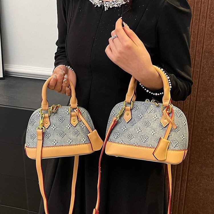 Light luxury Fashionable female Advanced printed retro light luxury hand-held vintage flower shell bag new versatile and temperament crossbody bag sho
