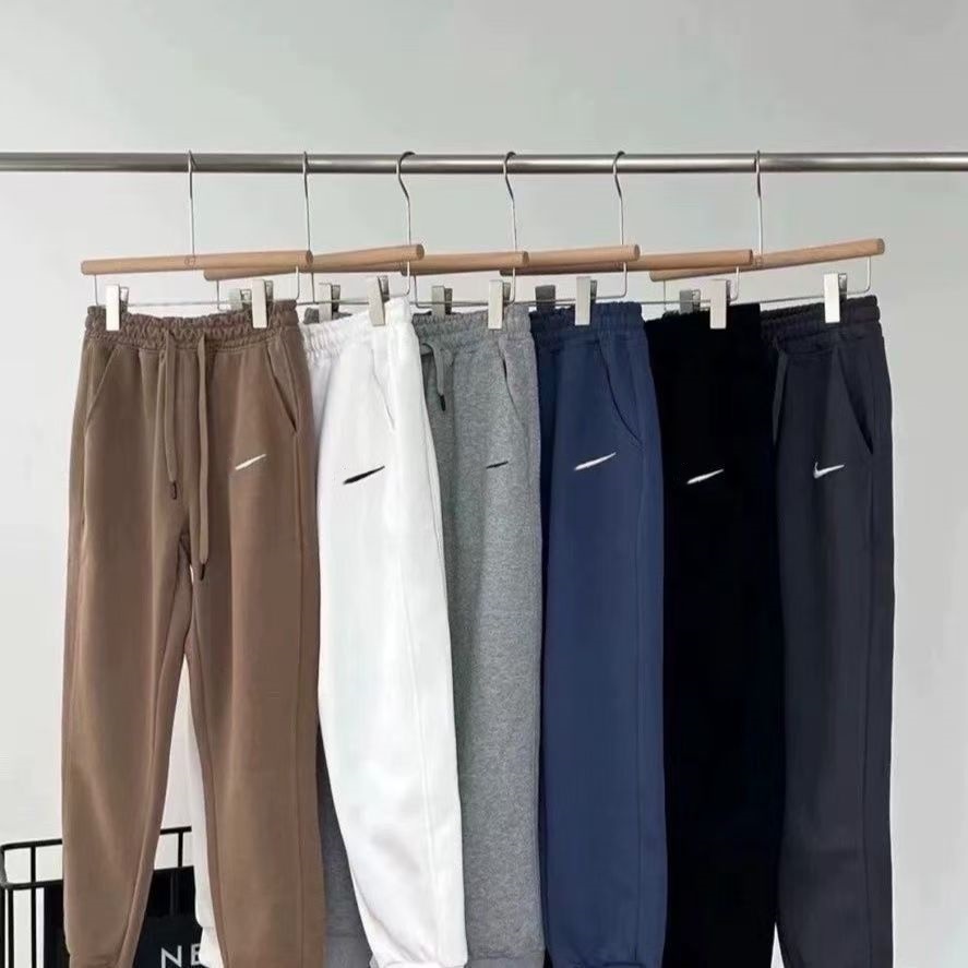 Unisex Fashion Sweatpants and Shorts Tech Fleece Paneled Joggers Designer Streetwear for Men and Women Casual Fit Urban Sports Trousers Cool Everyday Workout Look