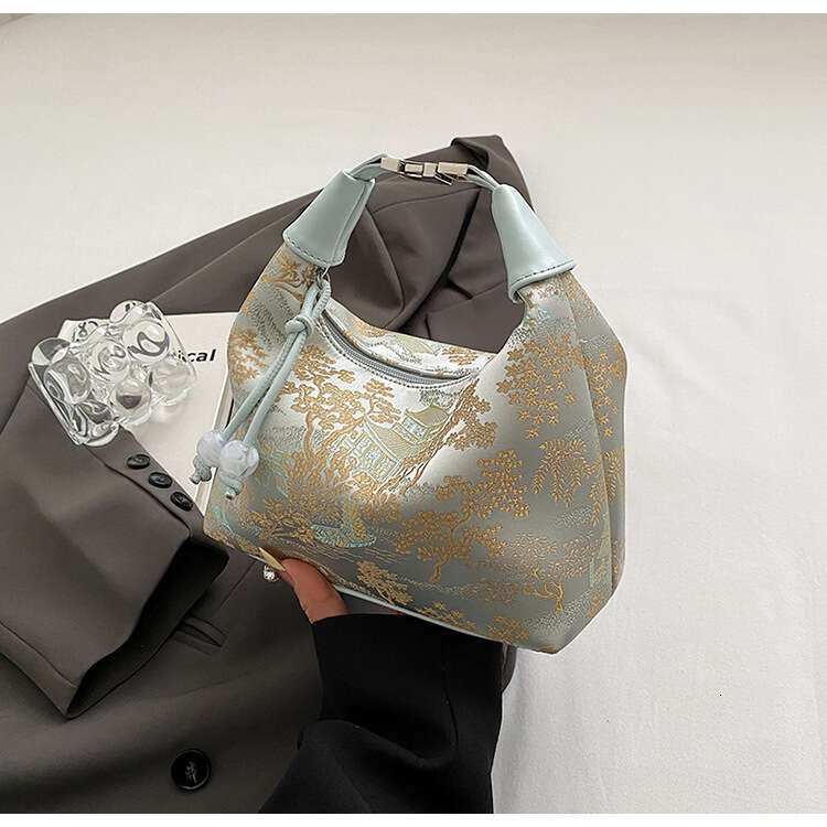 handheld new chinese style 2024 summer fashion embroidered pea niche highend simple crossbody bag for women