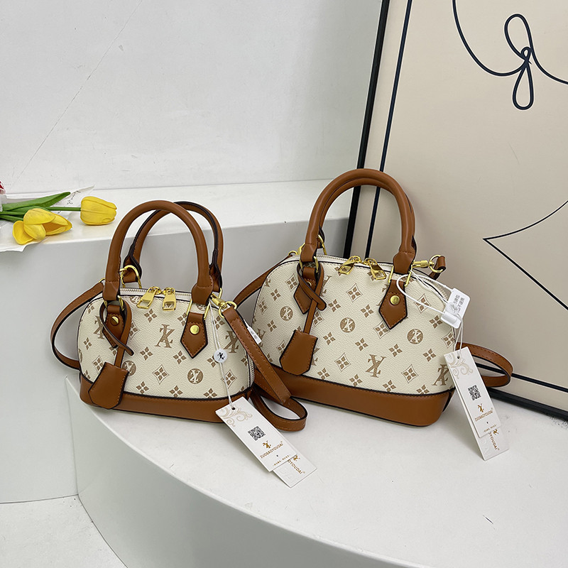 Light luxury Fashionable female Advanced printed retro light luxury hand-held vintage flower shell bag new versatile and temperament crossbody bag sho