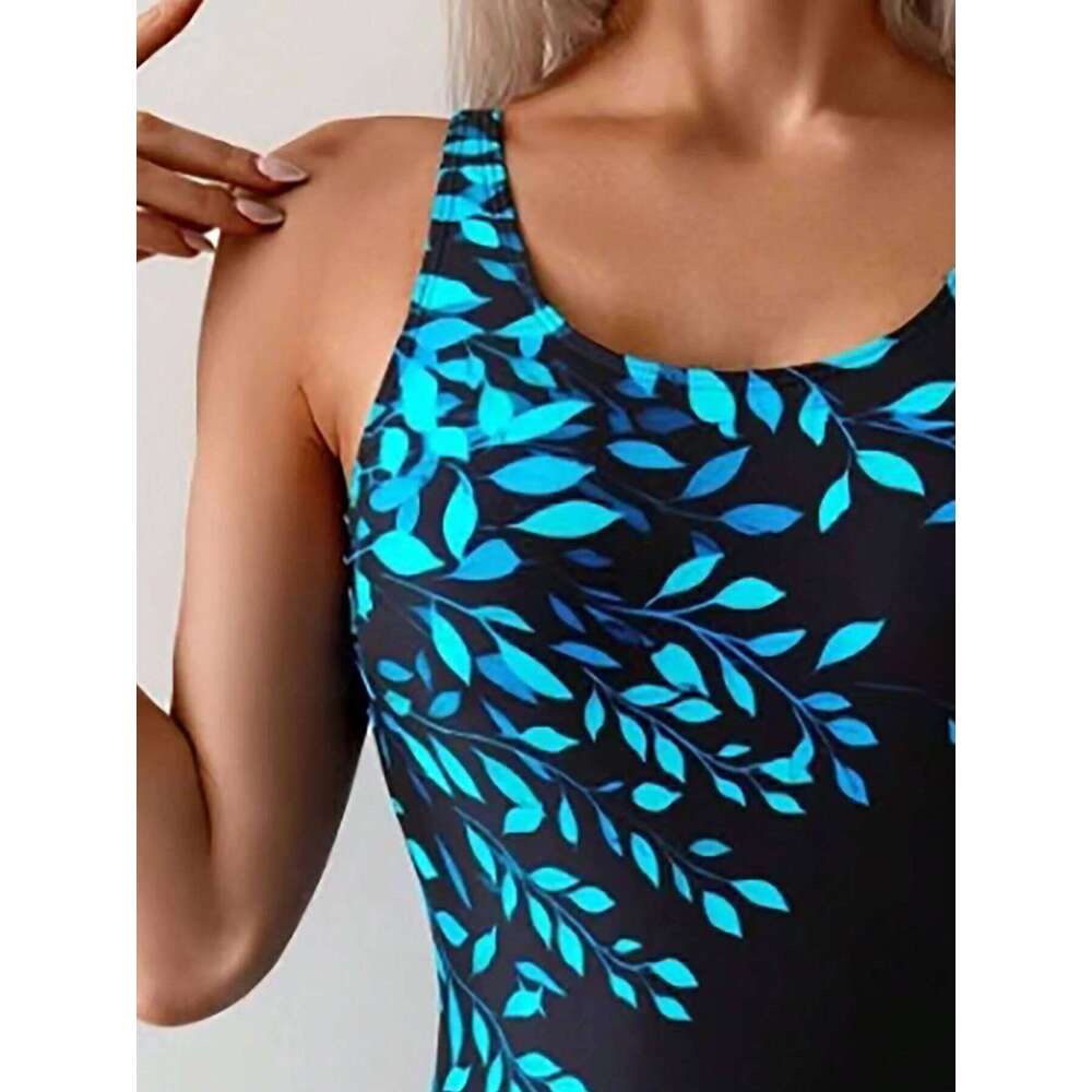 Fashionable Modest One-Piece Swimsuit for Women with a Leaf Print And Skirt, Designed to Flatter The Figure.