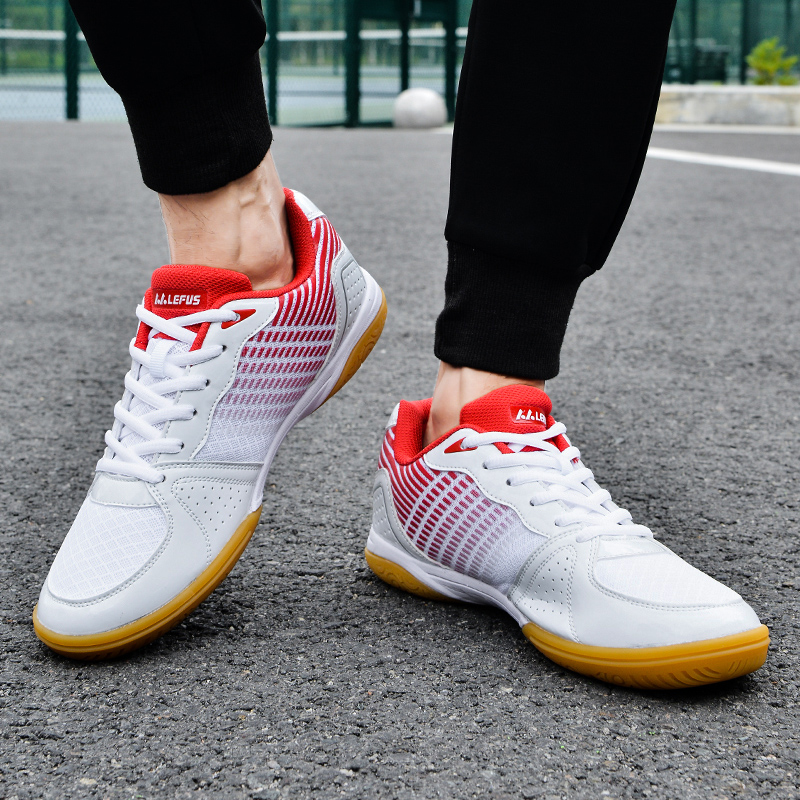 Anti-skid, wear-resistant, and shock-absorbing professional table tennis training shoes for men and women with a rubber sole