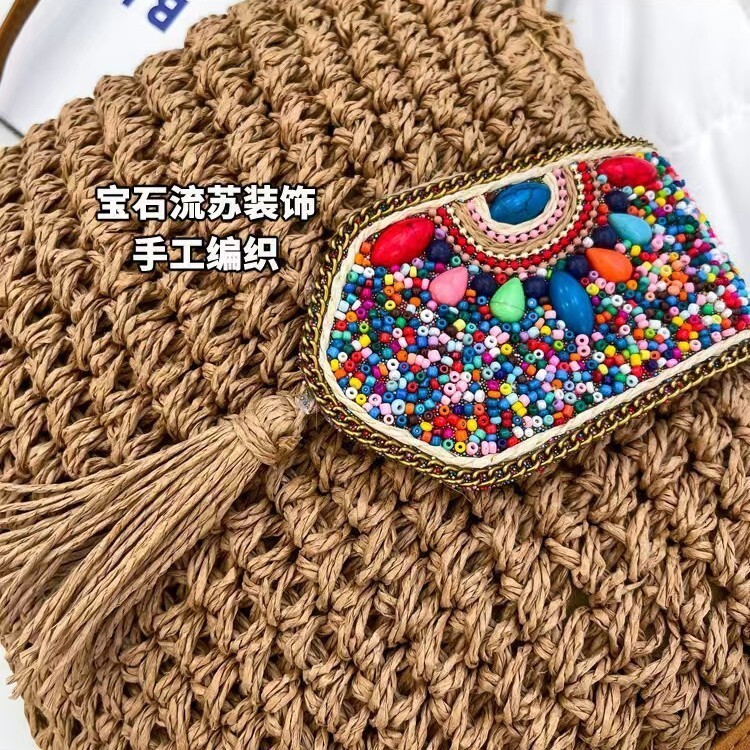 2025 designer's new tassel small bag hand woven multifunctional single shoulder straw bag hollow antique crossbody bag