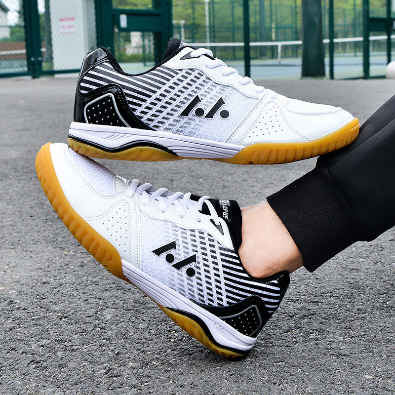 Anti-skid, wear-resistant, and shock-absorbing professional table tennis training shoes for men and women with a rubber sole