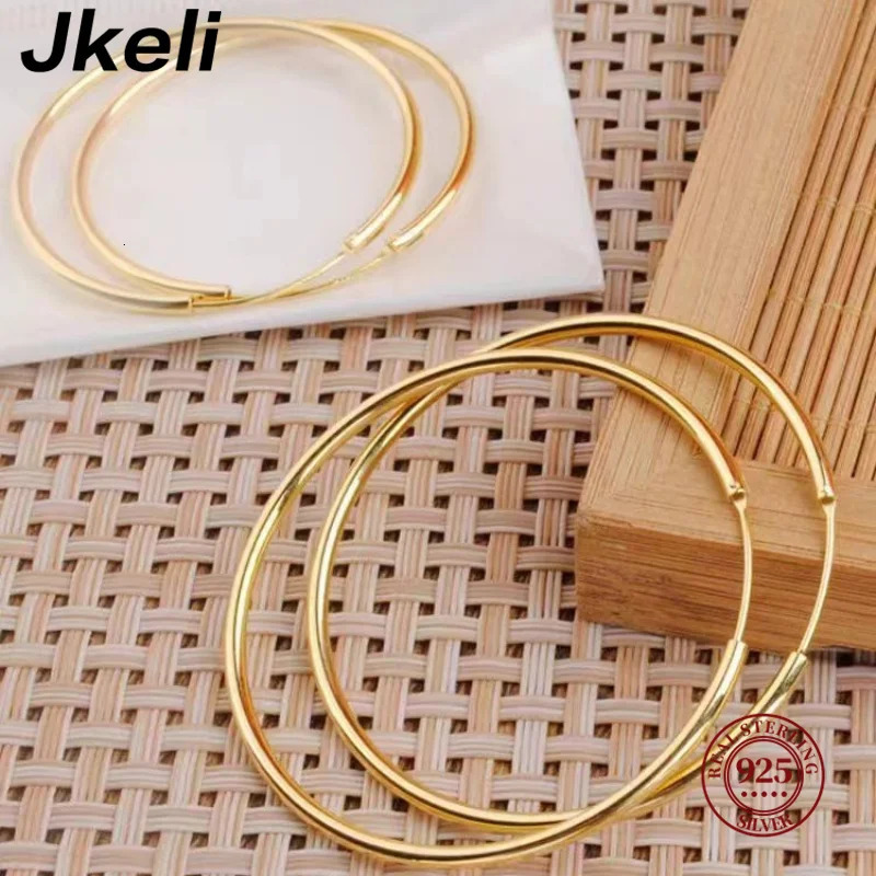 Jkeli Genuine 925 Sterling Silver Fashion Korean Simple Hoop Earrings for Women Men Charming Chic Party Jewelry Accessories 250716