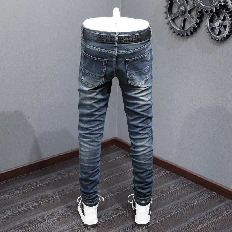 Designer High Street Fashion Jeans Stretch Slimming Washed Deep Blue Jeans Black Leather Patch Hip Hop Brand Pants Hombre X250718