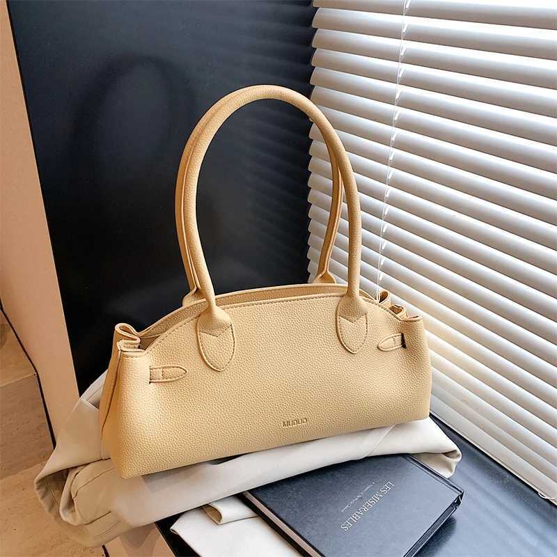 Pebbled Lychee Textured PU Tote BagWomen Niche Designer Shoulder BagBucket Dumpling Shaped HandbagCommuter Handheld Briefcase Z250718