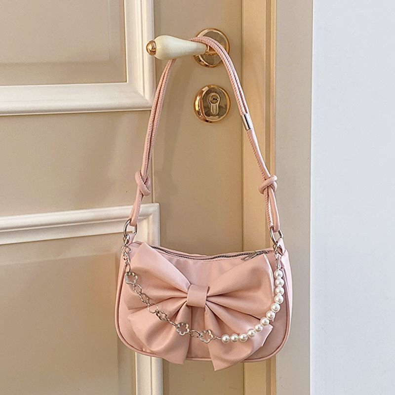 Summer New Women's Single Shoulder Crossbody Bag Summer New Solid Color Bow Chain Design Fashion Women's Texture Underarm Bag New Designer B